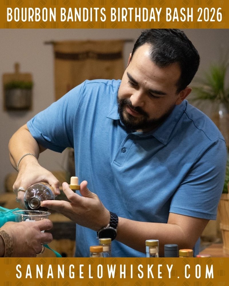 A member pouring a whiskey sample at a Collective gathering